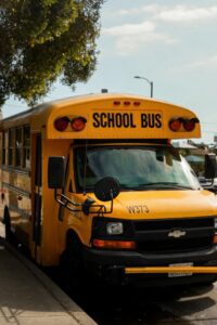 News and Resources 6 Yellow school bus parked on a residential street in South Los Angeles